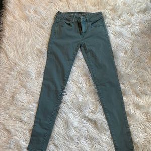 Gently worn light green Super Stretch jeans